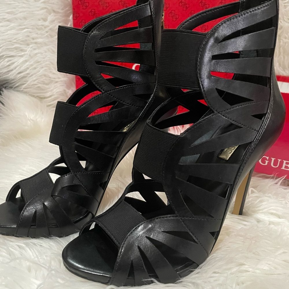 Guess Aela black high-heeled sandals w/ caged open-toe design and thin stiletto